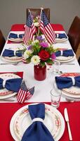 Patriotic table setting showcasing American flags and a redwhiteblue theme photo