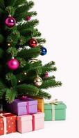 Isolated Christmas tree adorned with gift boxes Clip Art photo