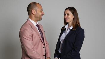 A portrait depicting a business coach guiding their client during a mentorship session photo
