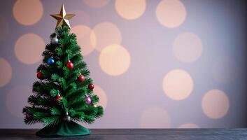 Green Christmas Tree with Bright Ornaments Against Glowing Background photo