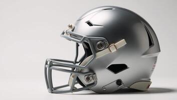 Sleek metallic football helmet on a clean white backdrop photo