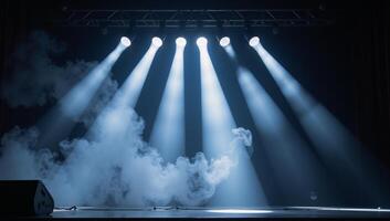 Dramatic stage with vibrant lighting effects and thick fog photo