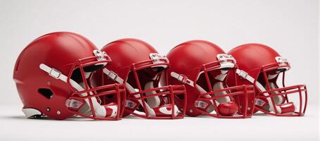 Mediumshot image featuring red American football helmets against a white backdrop photo