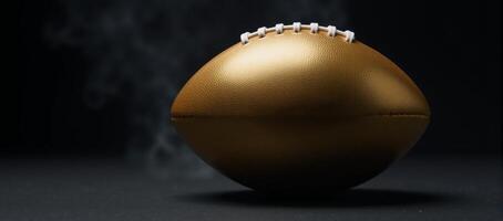 Goldplated football laces shine on an officialsize ball amidst a foggy backdrop creating a sense of championship games tension photo