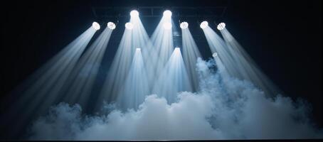 Dramatic stage with vibrant lighting effects and thick fog photo