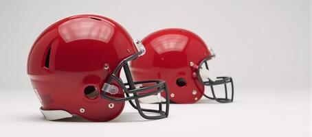 Closeup image Red American football helmets against a white backdrop photo