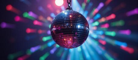 Disco ball against colorful light backdrop for event promotions photo