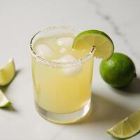 Classic Margarita with Lime Wedge Isolated against Background photo