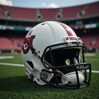 Closeup shot of an empty football helmet set against a blurry stadium backdrop emphasizing intricate sports gear and equipment details photo