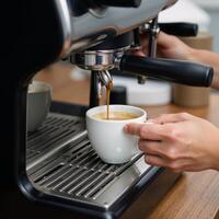 Barista crafts flawless espresso using modern espresso equipment photo