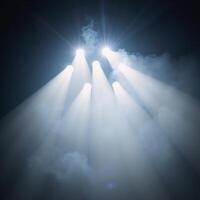 Dramatic stage illumination with billowing smoke effects photo