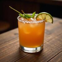 Spicy Orange Margarita served on a Rustic Wood Table photo
