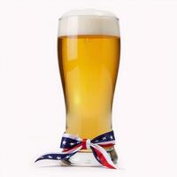 Patrioticthemed beer glass featuring an American flag design ideal for festive occasions or holidays photo