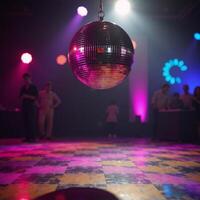 A vibrant scene featuring a disco ball against a backdrop of spinning lights and more disco balls photo