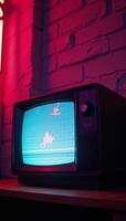 Retro TV set with glitching digital effects in neonlit room photo