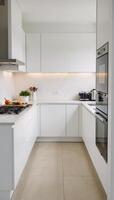 Modern minimalist kitchen scene featuring blurred white furnishings photo