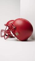 Closeup image Red American football helmets against a white backdrop photo