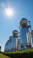 Blue spherical hydrogen tanks in a modern innovation power station showcasing BPVC technology and housing H2 molecules beneath the summer sky photo
