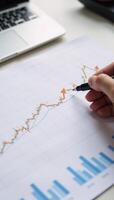 Stock market investment data visualized as an upward trend business financial chart with arrows photo
