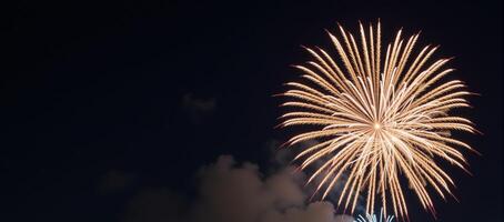 Bright whiteandgold New Years Eve fireworks display against a clean background photo