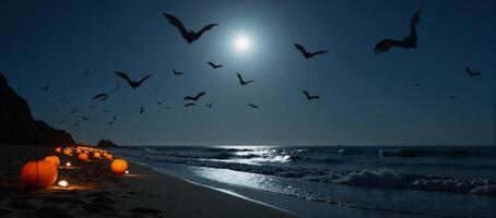 Bats flying over a pumpkinlit Halloween beach scene photo
