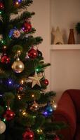 A traditional Christmas tree adorned with nostalgic ornaments photo