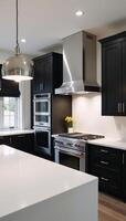 Modern kitchen design showcasing black cabinetry photo