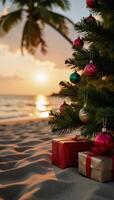 Christmas tree adorned with ornaments and gifts set against a sandy beach at sunset photo