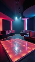 A highend futuristic club featuring an illuminated dance floor glowing LED walls and lavish VIP areas photo