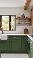 A rustic green kitchen featuring wooden shelves and white tile details photo