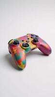A vibrant colorful game controller stands against a pristine white backdrop photo