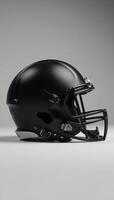 Side view of blank black American Football helmet mockup photo