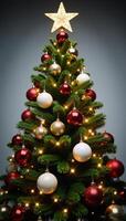 A lavishly adorned Christmas tree features colorful ornaments sparkling lights and a shining star atop it photo