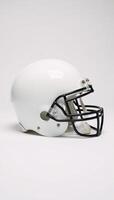 A modern American football helmet fills a crisp white backdrop with intricate details and striking clarity photo