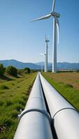Hydrogen pipeline amidst windpowered energy source wind turbines photo