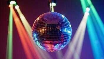 A dancing disco ball illuminates an abstractcolored backdrop in a vibrant nightclub setting photo