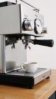 Digital illustration depicts an espresso machine pouring coffee into a waiting cup photo