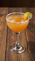 Spicy Orange Margarita on Rustic Wood Table Cocktail Rustic photo