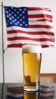 A beer in hand with a stylized US state flag as the backdrop photo
