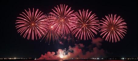 Colorful fireworks illuminate the night sky against a backdrop of darkness photo