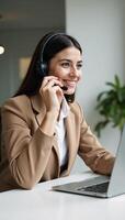 Closeup portrait of an Indian Customer Service Rep in office wearing a headset symbolizing support services photo