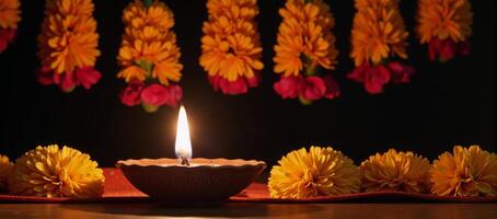 Marigolds and Torans adorn a traditional Diwali backdrop photo