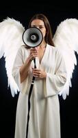 Angel with megaphone symbolizing effective communication photo