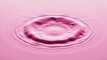 A pink circular water splash is displayed in an isolated setting photo