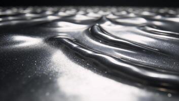 Silver abstract backdrop with flowing metal texture photo