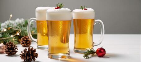 Three frosty glasses of beer adorn a wintry scene on a white table surrounded by pinecones and decorative elements evoking the joyous holiday atmosphere photo