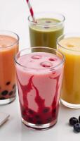 Indulge in summers refreshments vividhued smoothies cooling bubble teas in crystalclear cups photo