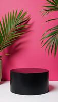 Glossy black 3D podium amidst tropical palms against a vibrant pink backdrop photo