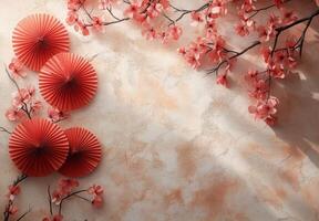 Elegant display of cherry blossoms and paper fans on a light background for spring decor photo