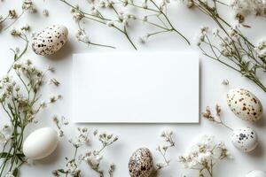 Springtime arrangement of colorful eggs and wildflowers on a rustic surface in bright daylight photo